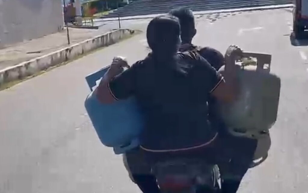 Perigo sobre duas rodas: casal é flagrado transportando botijas de gás sem capacete no Amazonas